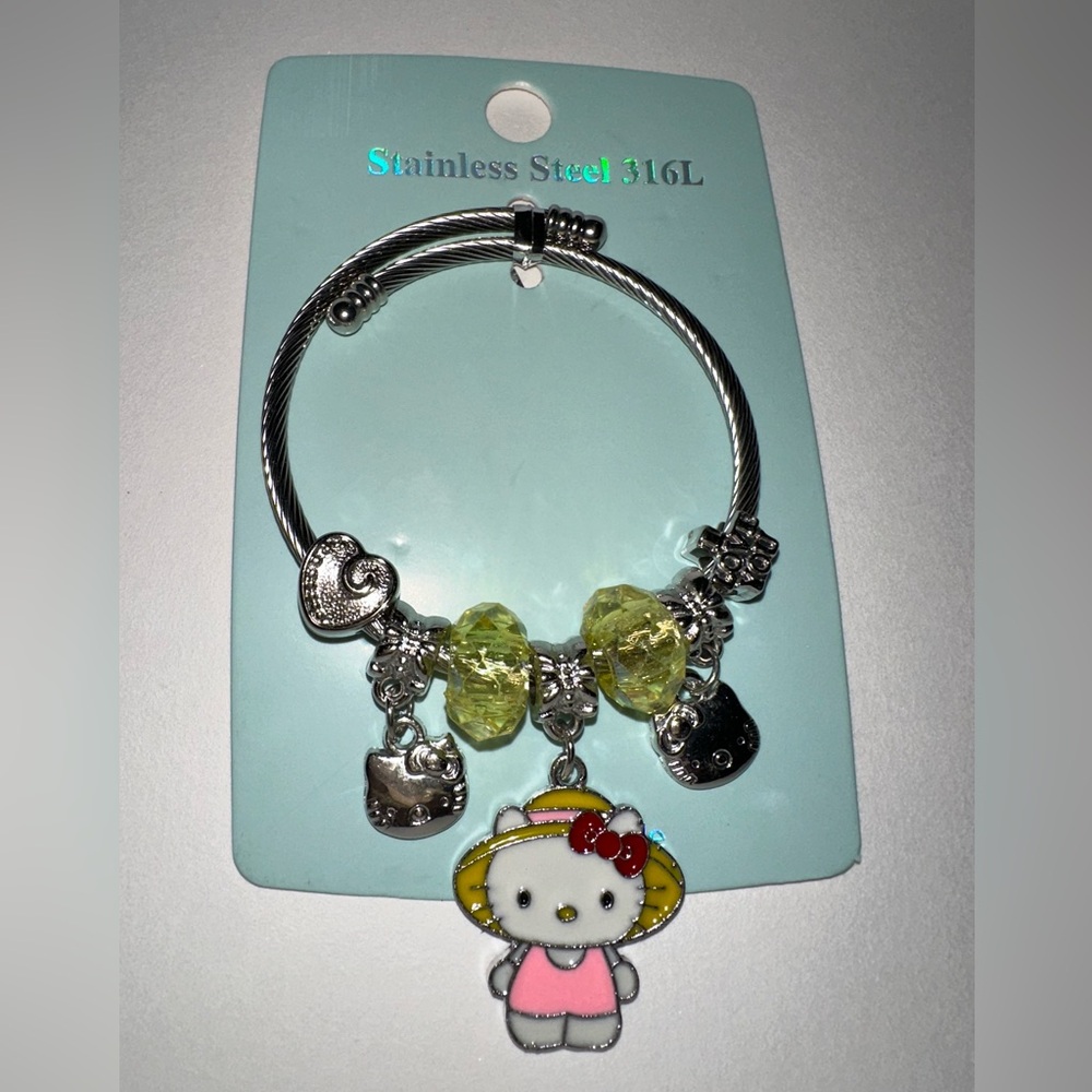 Stainless steel HK Silver and Yellow Charm Bracelet